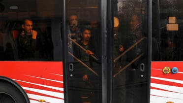 Passengers travel on a public bus in downtown Tehran, Iran, Thursday, Dec. 5, 2019. (AP)
