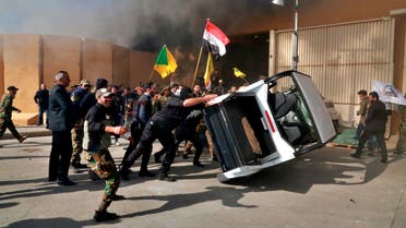 Protesters damage property inside the U.S. embassy compound, in Baghdad, Iraq, Tuesday, Dec 31, 2019. (AP)