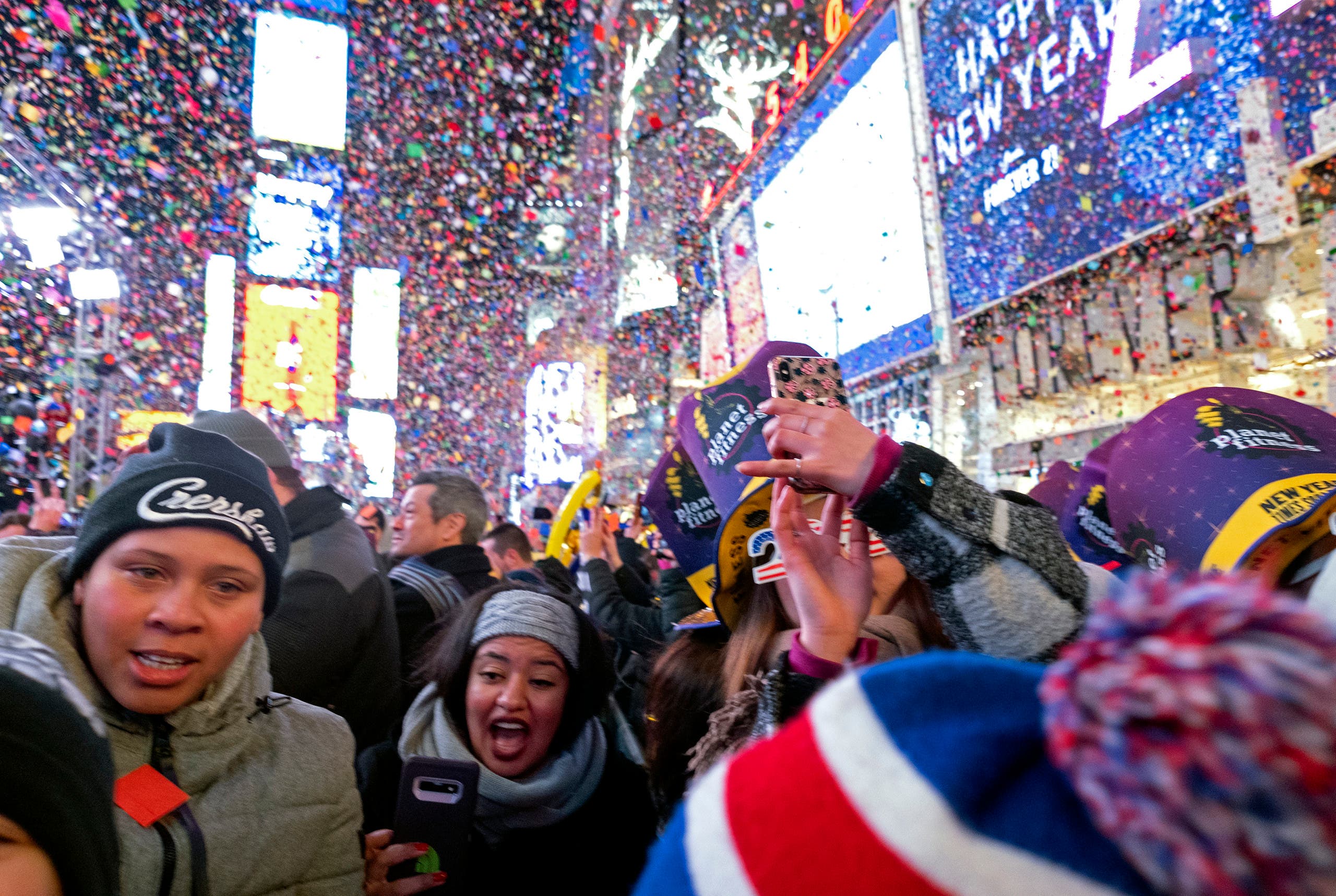 Confetti falls during a New Year's celebration in New York's Times Square, Wednesday, Jan. 1, 2020. (AP Photo/Adam Hunger)