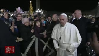 Pope: Sorry I lost patience with hand-shaker who yanked me