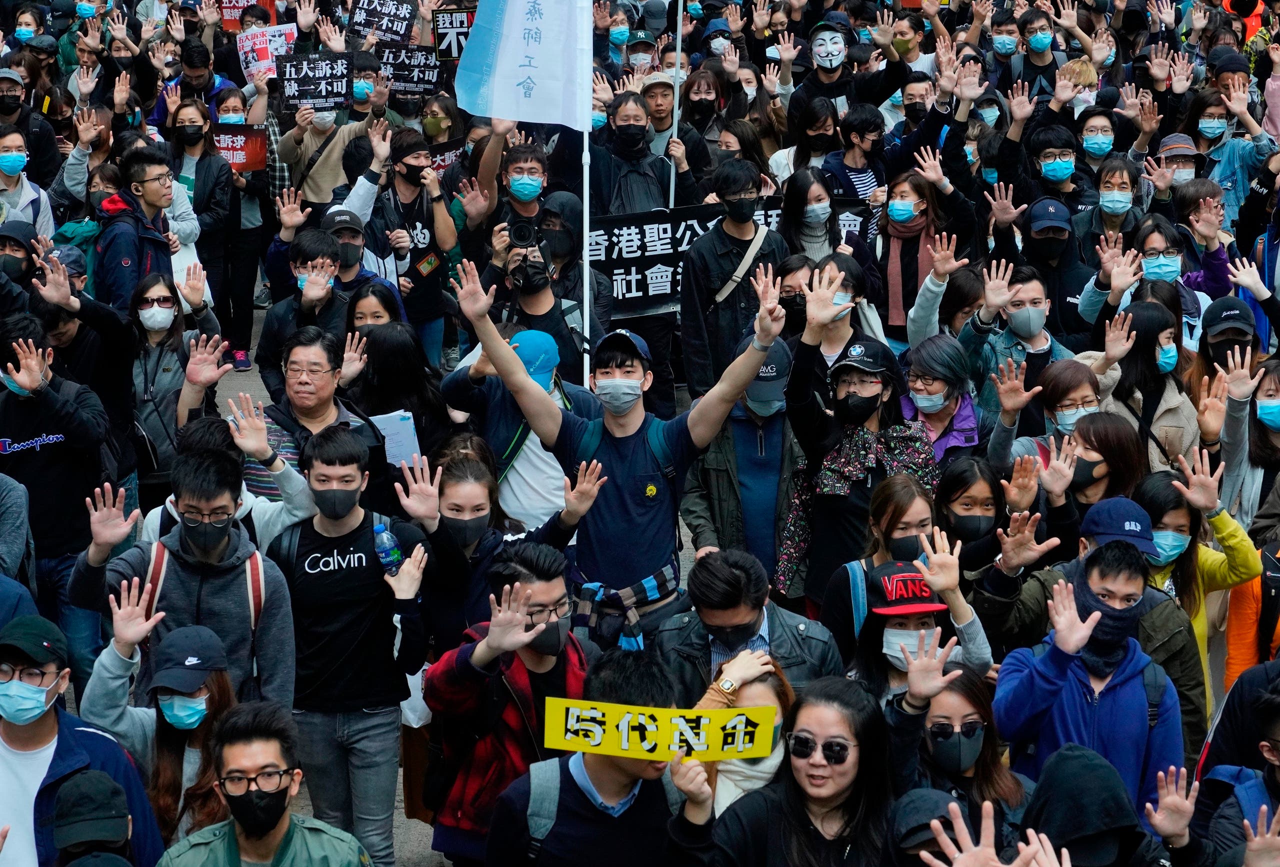 Hong Kong people participate in their annual pro-democracy march on New Year's Day to insist their five demands be matched by the government in Hong Kong on Jan. 1, 2020. (Photo: AP)