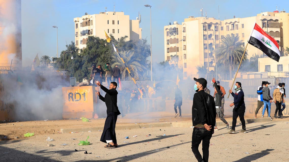 Protesters and militia fighters during a protest outside the US Embassy in Baghdad on January 1, 2020. (Photo: Reuters)
