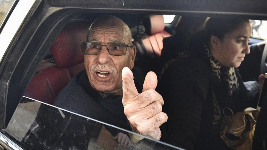 Algerian war veteran Lakhdar Bouregaa gestures in a car upon his release in Algiers on January 2, 2020. (AFP)