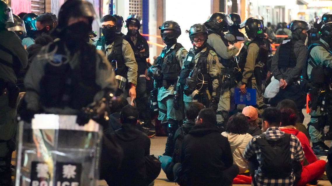 Police detain protesters in Hong Kong, Wednesday, Jan. 1, 2020. Hong Kong toned down its New Year’s celebrations amid the protests that began in June. (AP)