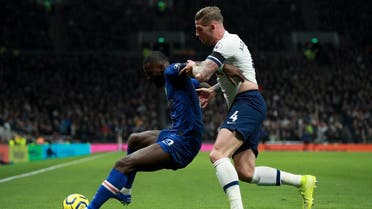 Chelsea’s Antonio Rudiger (L) is tackled by Tottenham’s Toby Alderweireld during the match at the Tottenham Hotspur Stadium in London, Sunday, Dec. 22, 2019. (AP)