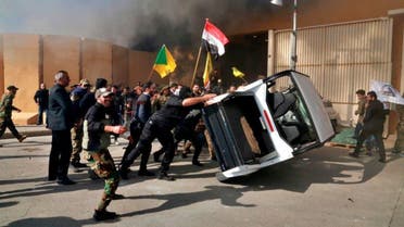 Protesters damage property inside the U. embassy compound, in Baghdad on Dec 31, 2019. (Photo: AP)