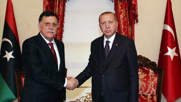 Turkey's President Recep Tayyip Erdogan, right, shakes hands with Fayez al Sarraj, the head of Libya's internationally recognised government, prior to their talks in Istanbul, Sunday, Dec. 15, 2019. (AP)