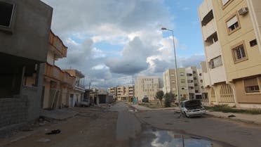 The main road in central Sirte is deserted after civilians fled the area amid fierce battles between fighters of Libya's new rulers and loyalist troops on October 13, 2011. AFP PHOTO / AHMAD AL-RUBAYE