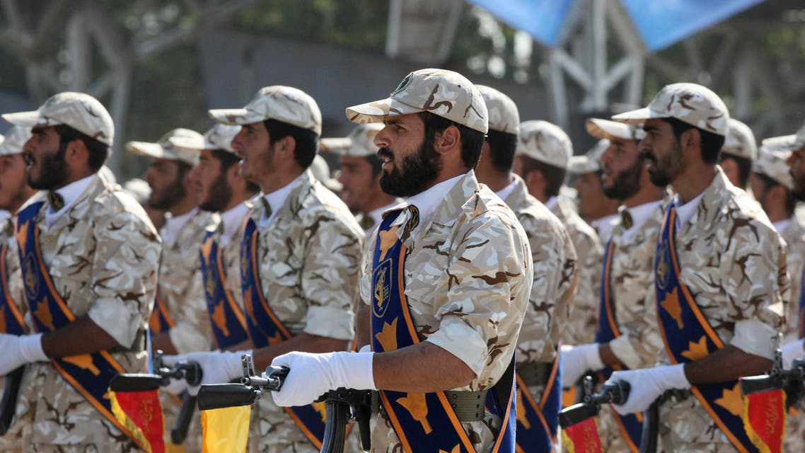 In this Sept. 22, 2011 photo, members of Iran's Revolutionary Guard march in front of the mausoleum of the late Iranian revolutionary founder Ayatollah Khomeini, just outside Tehran, Iran, during armed an forces parade marking the 31st anniversary of the start of the Iraq-Iran war. (AP)