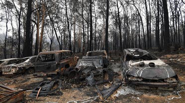 This picture taken on January 6, 2020 shows charred vehicles gutted by bushfires in Australia's New South Wales state. (AFP)