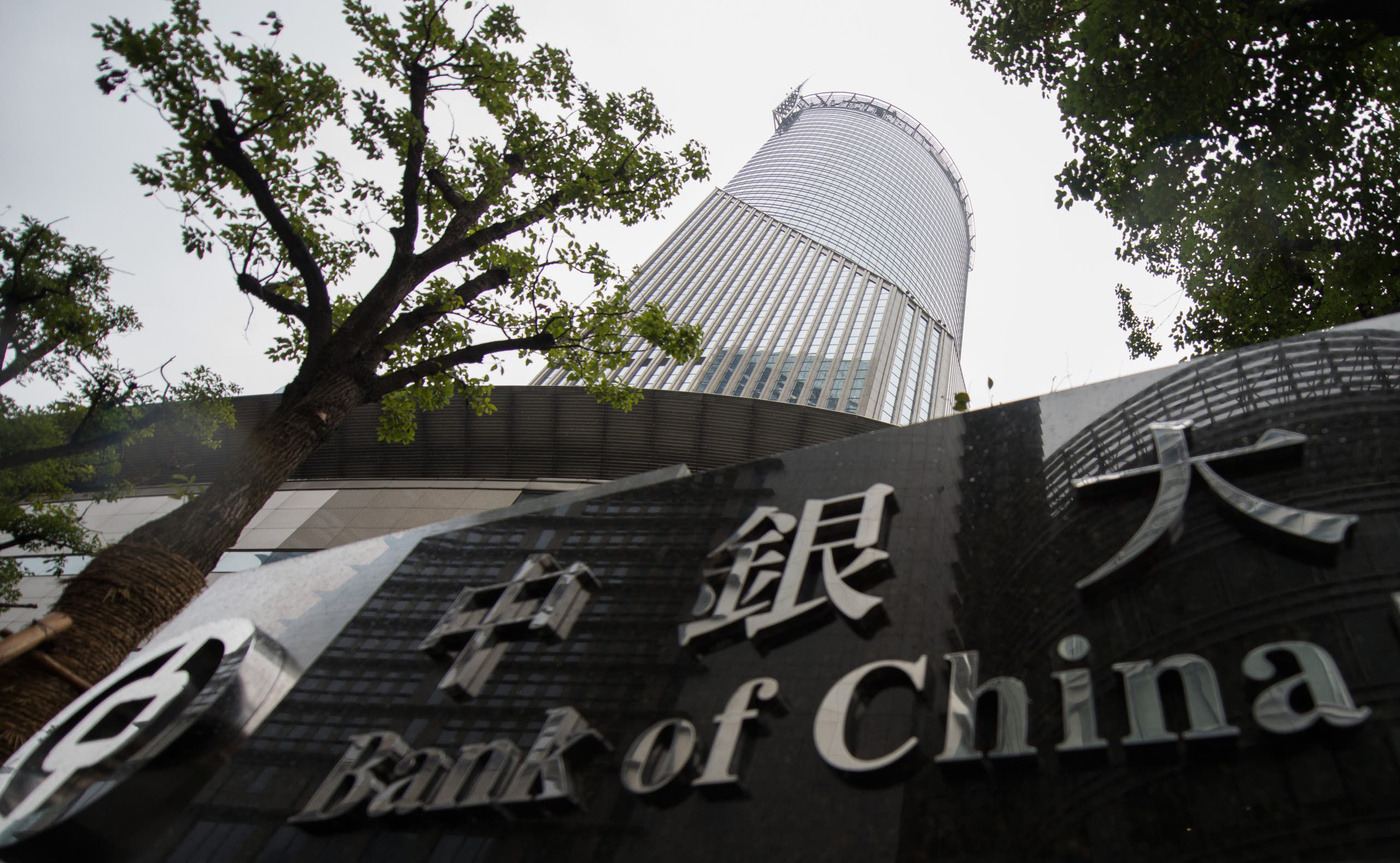 Bank of China Tower in Shanghai on a cloudy rainy day