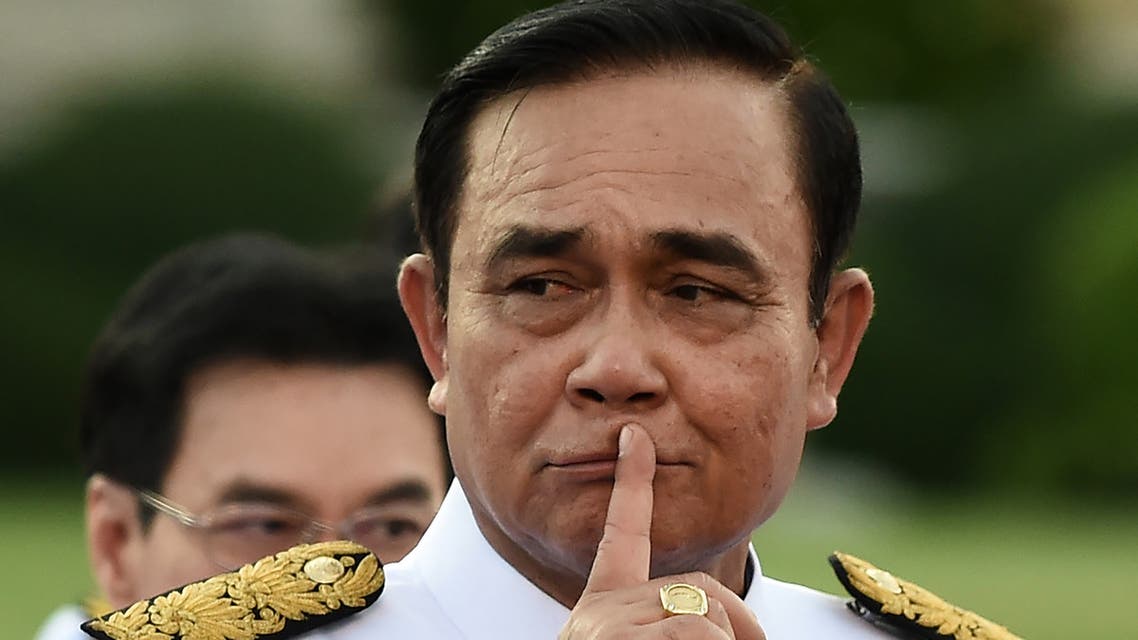 Thailand's Prime Minister Prayut Chan-O-Cha gestures as he arrives for a photo opportunity with members of the new Thai cabinet at Government House in Bangkok on July 16, 2019.