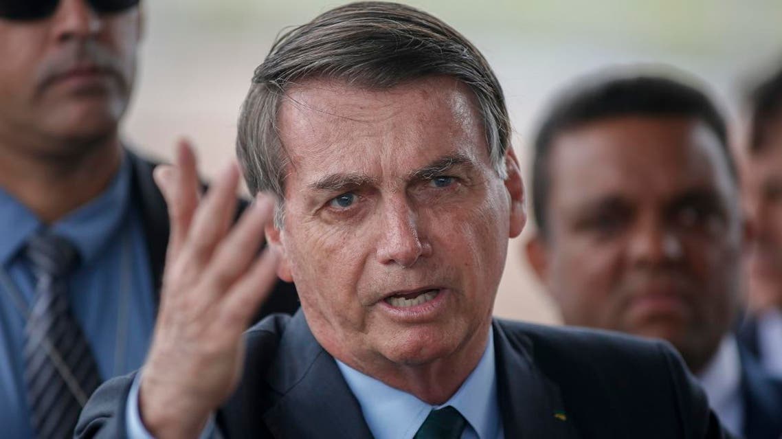 Brazilian President Jair Bolsonaro speaks to the press about the Iran crisis, outside the Alvorada Palace in Brasilia, Brazil, on January 7, 2020. (File photo: AFP)