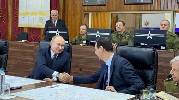 Russia’s Putin Makes Rare Visit To Syria, Meets Assad