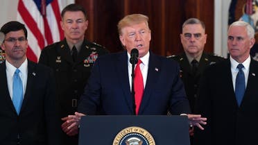 US President Donald Trump(C) speaks about the situation with Iran in the Grand Foyer of the White House in Washington, DC, January 8, 2020. (AFP)