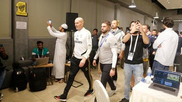 Real Madrid’s head coach Zinedine Zidane arrives for a press conference in Jiddah, Saudi Arabia, on January 7, 2020. (AP)