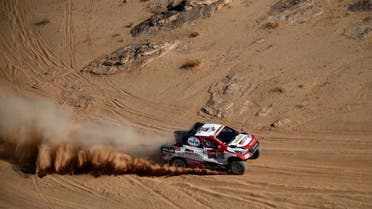 Toyota’s Spanish driver Fernando Alonso and Spanish co-driver Marc Coma compete during the Stage 4 of the Dakar 2020 between Neom and Al-Ula, Saudi Arabia, on January 8, 2020. (AFP)