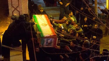 Mourners carry the coffin of Iranian Major-General and head of the elite Quds Force Qassem Soleimani, who was killed in an air strike at Baghdad airport, during the funeral at his hometown in Kerman, Iran. (Reuters)