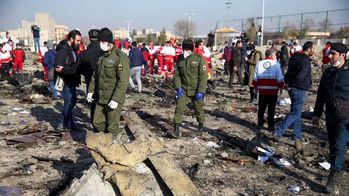 Security officers and Red Crescent workers are seen at the site where the Ukraine International Airlines plane crashed, on the outskirts of Tehran, Iran January 8, 2020. (Photo: Reuters)