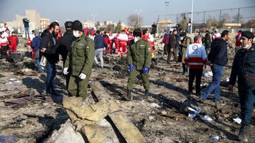 Security officers and Red Crescent workers are seen at the site where the Ukraine International Airlines plane crashed, on the outskirts of Tehran, Iran January 8, 2020. (File photo: Reuters)