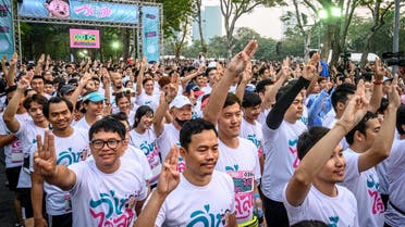 People take part in a "run against dictatorship" in Bangkok on January 12, 2020. (Photo: AFP)