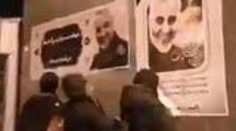 Video shows Iranian protesters ripping up pictures of slain Qassem Soleimani