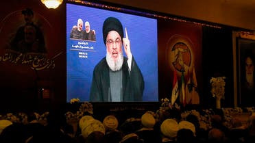 Nasrallah delivers a speech on a screen in the southern Lebanese city of Nabatieh on January 12, 2020. (AFP)