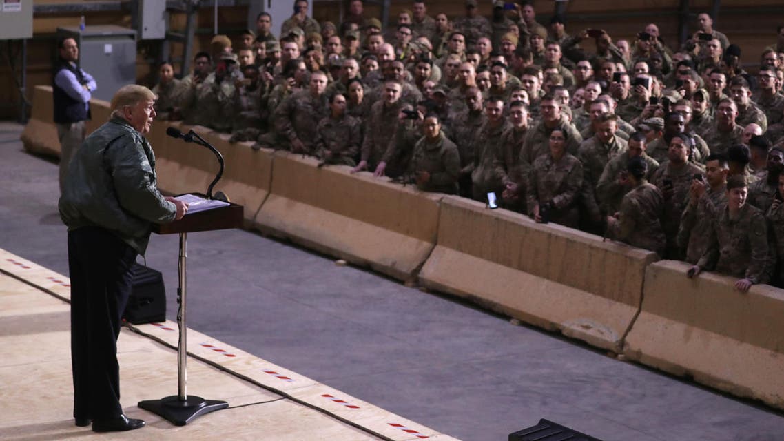 US President Donald Trump delivers remarks to US troops in an unannounced visit to Al Asad Air Base, Iraq December 26, 2018. File photo: (Reuters)