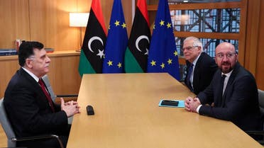Libyan Prime Minister Fayez Al-Sarraj (L), speaks with European Council President Charles Michel (R) and European Union foreign policy chief Josep Borrell (C) during their meeting at the Europa building in Brussels, on January 8, 2020. (AFP)