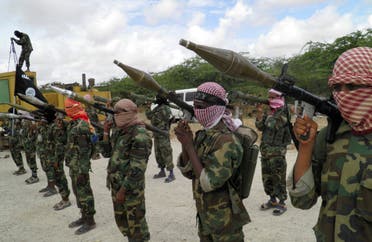 A file photo shows al-Shabaab fighters display weapons as they conduct military exercises in northern Mogadishu, Somalia. (AP)