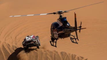 Driver Mathieu Serradori, of France, and co-driver Fabian Lurquin, of Belgium, race their Century during stage seven of the Dakar Rally between Riyadh and Wadi Al Dawasir, Saudi Arabia, on January 12, 2020. (AP)