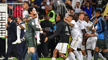 Real Madrid players celebrate winning the Spanish Super Cup final between Real Madrid and Atletico Madrid on January 12, 2020, at the King Abdullah Sports City in the Saudi Arabian port city of Jeddah. (AFP)