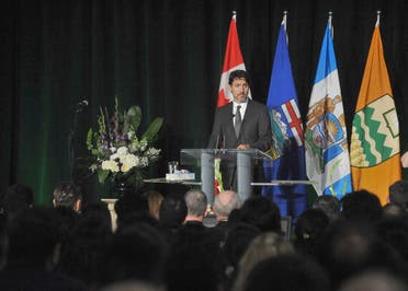 Canadian Prime Minister Justin Trudeau speaks at a memorial service for the victims of the Ukrainian Airlines flight PS752 crash in Iran at the Saville Community Sports Centre in Edmonton January 12, 2020. (AFP)