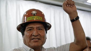 Bolivian ex-president Evo Morales, exiled in Argentina, gestures before offering a press conference after holding a meeting with members of his Movimiento al Socialismo (MAS) party to fix date and place to chose their presidential candidate for the Bolivian general election, in Buenos Aires, on December 29, 2019. The election of the MAS candidate will be held on January 19, 2020 in Buenos Aires.