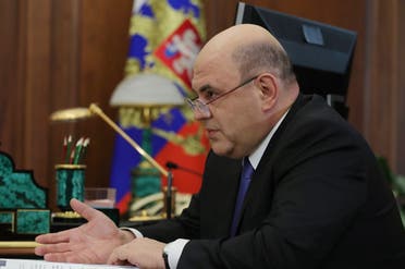 A file photo shows Mishustin attending a meeting with Russian President in Moscow on May 6, 2019. (AFP)