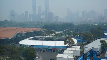A general view of the city skyline shrouded by smoke haze from bushfires during an Australian Open practise session at Melbourne Park in Melbourne. (Reuters)