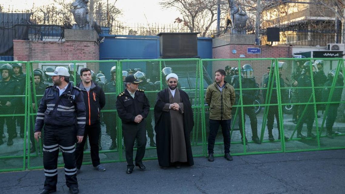 Iranian security forces stand guard in front of the British embassy in the capital Tehran on January 12, 2020 during demonstrations following the British ambassador's arrest. AFP