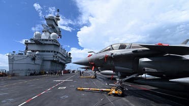 France's fighter jets Rafale are seen parked on the flight deck of the French aircraft carrier Charles de Gaulle during a media tour at Changi Naval Base in Singapore on May 28, 2019. (AFP)
