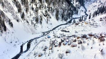 A general view of houses covered with heavily snow is pictured in Neelum Valley, in Pakistan-administered Kashmir on January 16, 2020. (AFP)