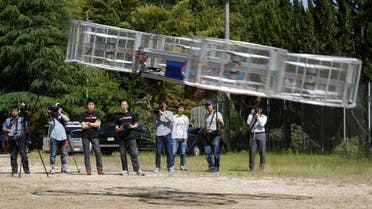 Project leader of Cartivator Tsubasa Nakamura watches the flight of the test model of the flying car on a former school ground in Toyota, central Japan, Saturday, June 3, 2017. (File photo: AP)