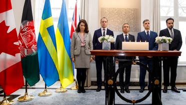 (L-R) Swedish Minister of Foreign Affairs Ann Linde, Ukrainian Minister of Foreign Affairs Vadym Prystaiko, Britain's Foreign Secretary and First Secretary of State Dominic Raab and Canadian Minister of Foreign Affairs Francois-Philippe Champagne share a minute's silence for the families of the victims of the Ukrainian plane shot down in Iran before a meeting of the International Coordination and Response Group, at the High Commission of Canada in London, on January 16, 2020. (AFP)