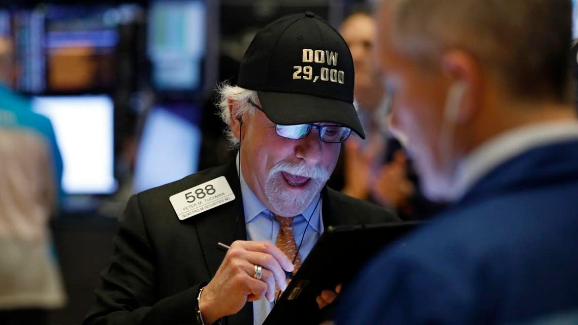Trader Peter Tuchman wears his “Dow 29,000” hat as he works on the floor of the New York Stock Exchange, on January 15, 2020, as the Dow Jones industrial average closed above 29,000 for the first time. (AP)