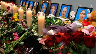 Download now     Flowers and candles are placed in front of portraits of the flight crew members of the Ukrainian 737-800 plane that crashed on the outskirts of Tehran, at a memorial inside Borispil international airport outside Kyiv, Ukraine, Saturday, Jan. 11, 2020. AP