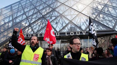 Striking employees demonstrate outside the Louvre museum Friday, Jan. 17, 2020 in Paris. (AP)