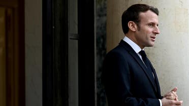 French President Emmanuel Macron waits to welcome European Council President at the Elysee palace in Paris on January 10, 2020. (AFP)