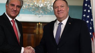 US Secretary of State Mike Pompeo welcomes Pakistani Foreign Minister Shah Mehmood Qureshi at the State Department on January 17, 2020, in Washington, DC. (AFP)