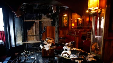 Inside view of the burned out remains of the restaurant La Rotonde, in Paris, Saturday, jan.18, 2020. (AP)