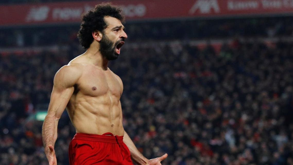 Liverpool's Mohamed Salah celebrates scoring their second goal. (Reuters)