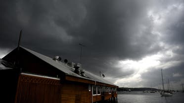 Storm clouds gather over Double Bay in Sydney on January 20, 2020. (AFP)