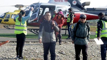 Trekkers arrive after a rescue operation from the Annapurna circuit, at the airport of Pokhara, some 200 km west of Kathmandu, on January 18, 2020. (Photo: AFP)